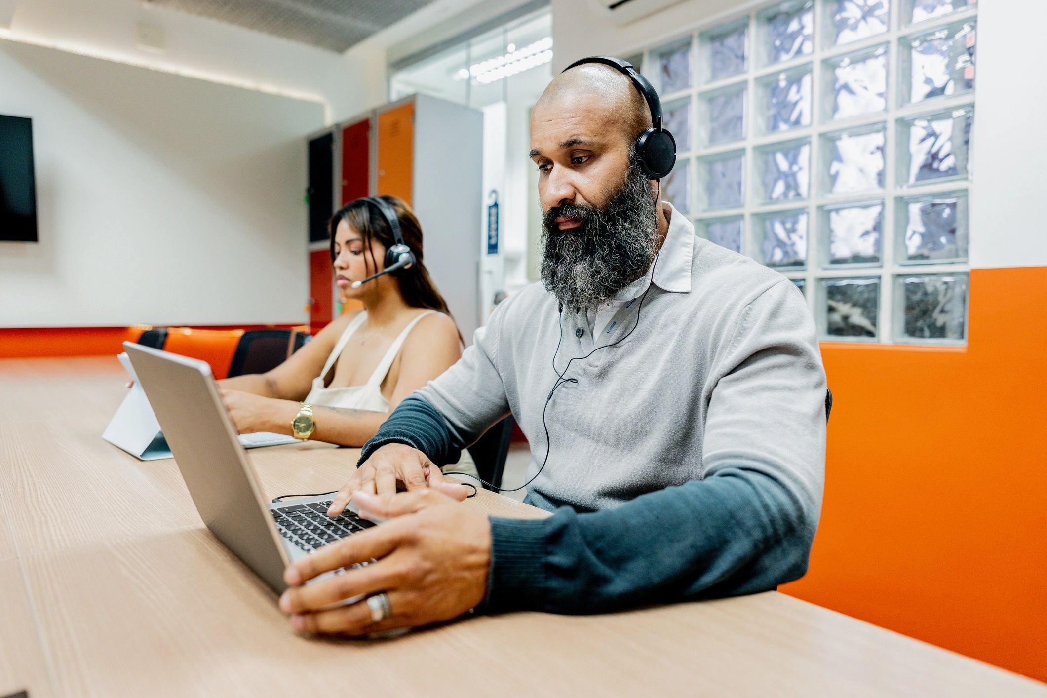 Customer support representative working with headset