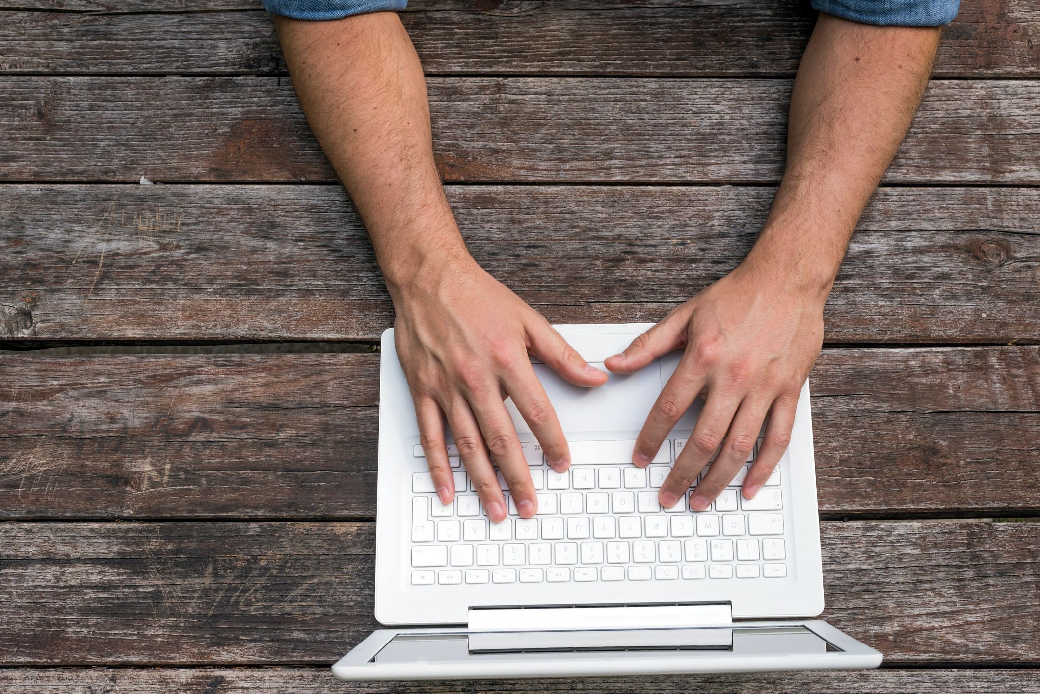 Laptop used to prepare professional email outreach